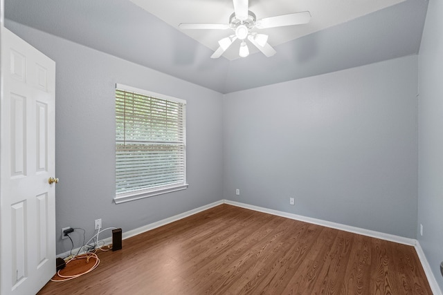 unfurnished room featuring hardwood / wood-style floors and ceiling fan