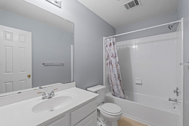 full bathroom featuring a textured ceiling, vanity, shower / bathtub combination with curtain, tile patterned flooring, and toilet