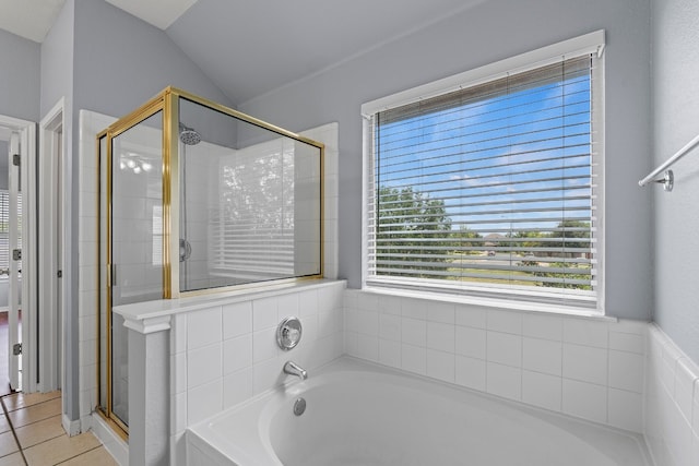 bathroom featuring tile patterned floors, plus walk in shower, and lofted ceiling