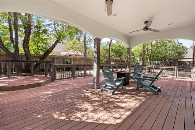 wooden terrace with ceiling fan