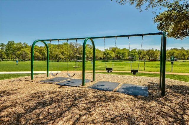 exterior space featuring a yard and a playground