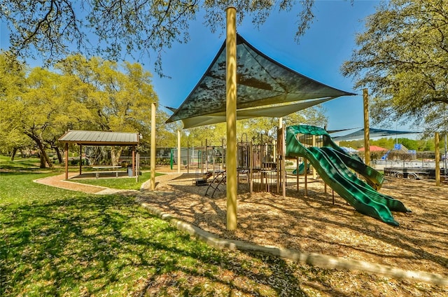 view of jungle gym with a lawn