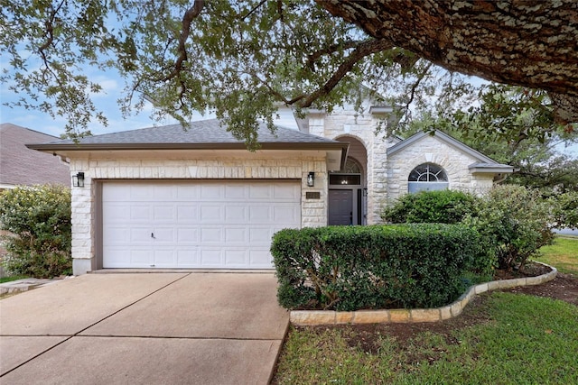 single story home featuring a garage