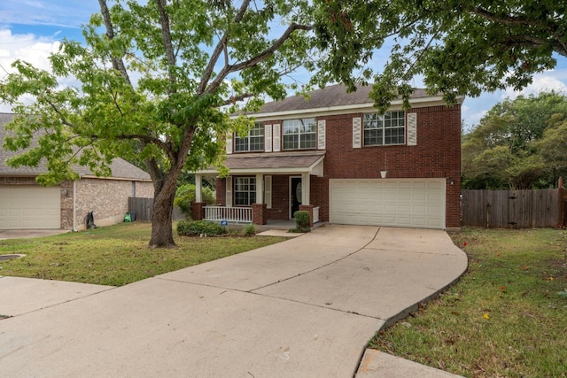 view of front facade with a front yard and a porch