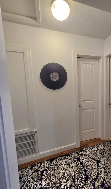 interior details featuring hardwood / wood-style flooring