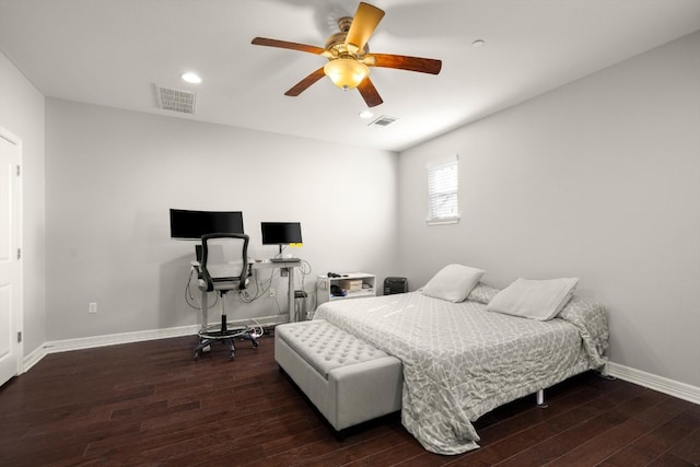 bedroom with ceiling fan and dark hardwood / wood-style flooring