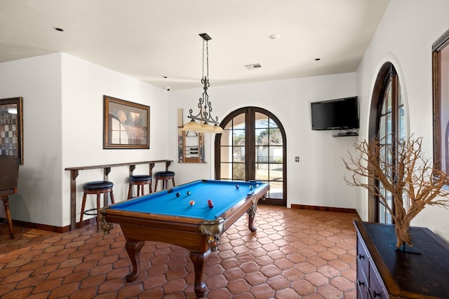 playroom with pool table and french doors