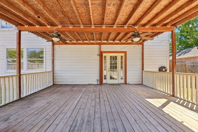 wooden deck featuring ceiling fan