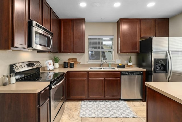 kitchen with appliances with stainless steel finishes and sink