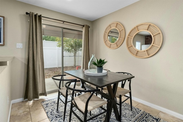 dining room featuring light tile patterned floors