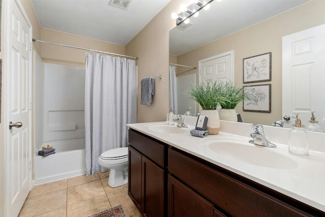 full bathroom featuring vanity, tile patterned flooring, toilet, and shower / bathtub combination with curtain