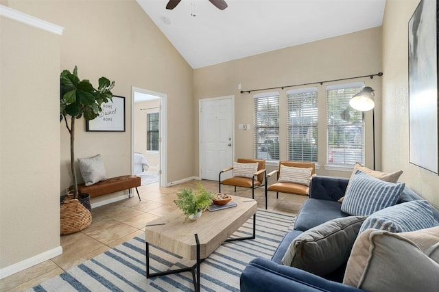 tiled living room featuring high vaulted ceiling and ceiling fan