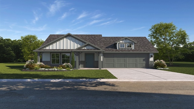 view of front of home with a garage and a front yard