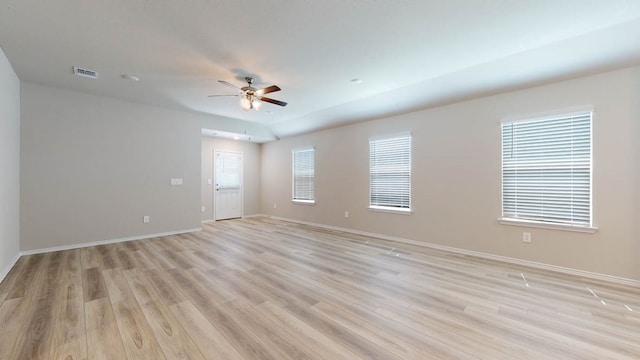 unfurnished room with ceiling fan and light hardwood / wood-style flooring