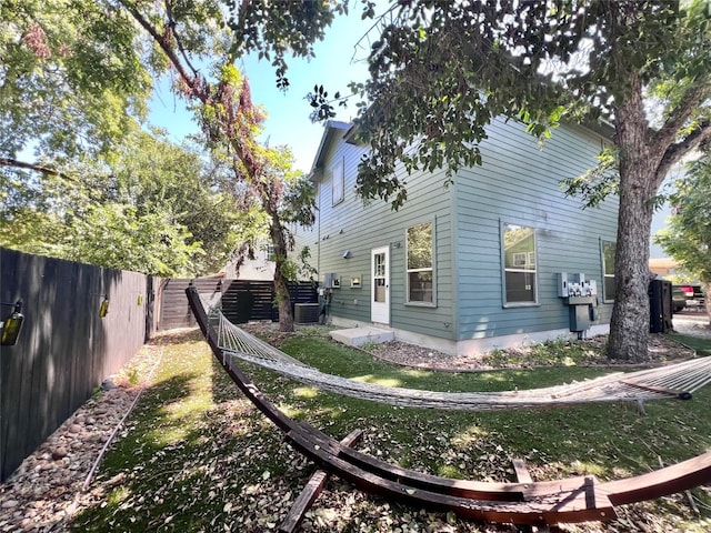 view of property exterior with central air condition unit