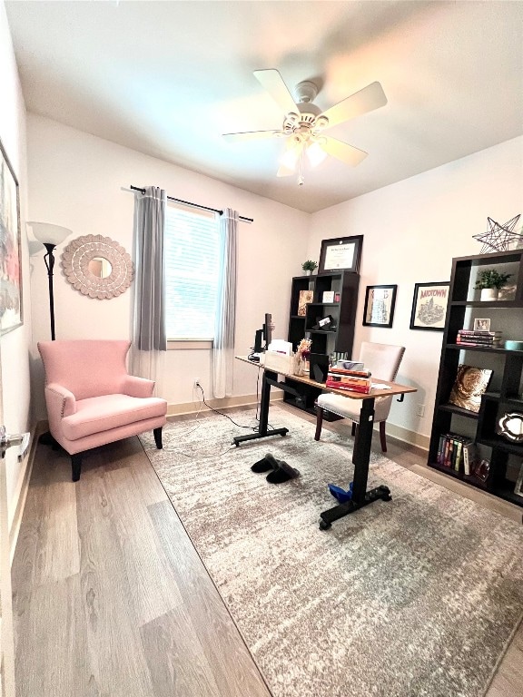 office space featuring ceiling fan and hardwood / wood-style flooring