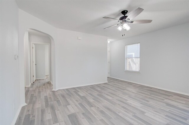 unfurnished room featuring ceiling fan and light hardwood / wood-style flooring