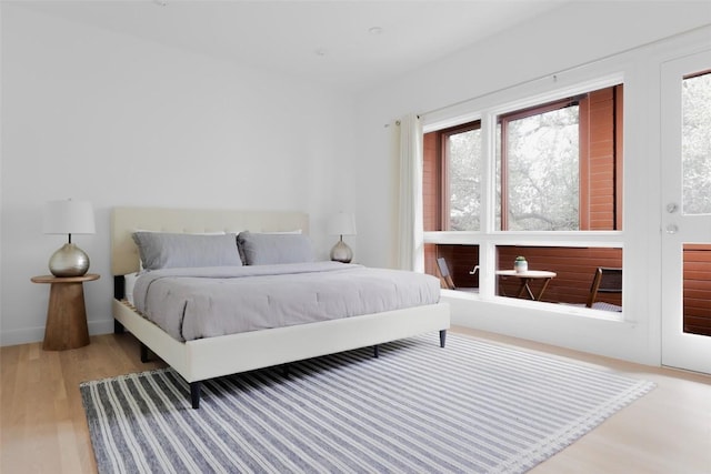 bedroom with light hardwood / wood-style flooring