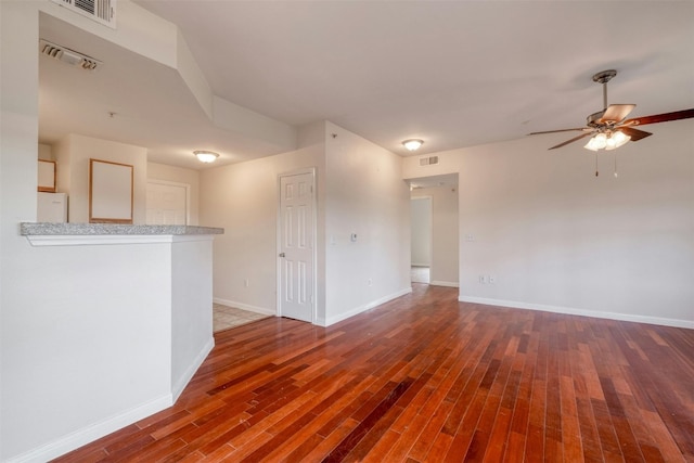 spare room featuring ceiling fan and wood-type flooring