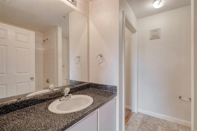 bathroom with washtub / shower combination and vanity