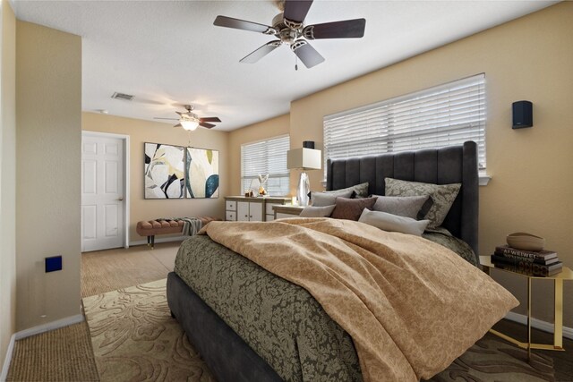 bedroom featuring ceiling fan