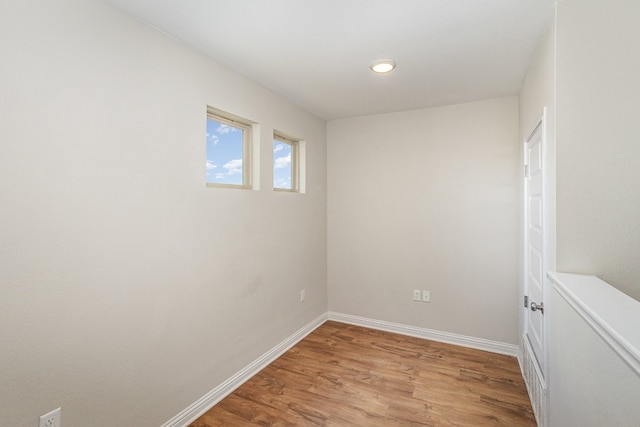 spare room featuring light hardwood / wood-style flooring