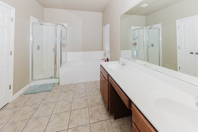 bathroom featuring tile patterned floors, vanity, and independent shower and bath