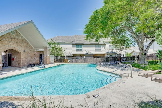 view of pool featuring a patio