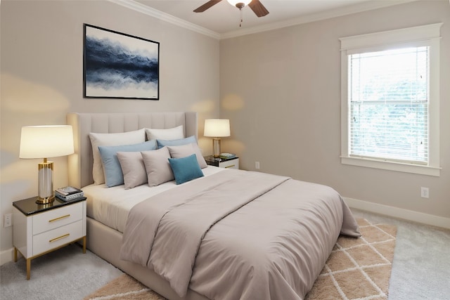 carpeted bedroom featuring multiple windows, ceiling fan, and crown molding