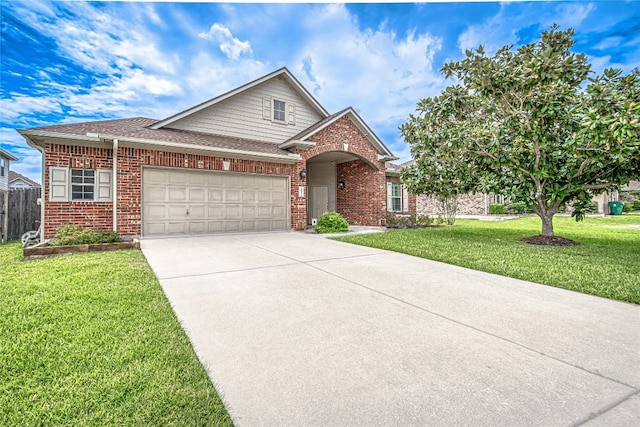 view of front of house with a garage and a front yard