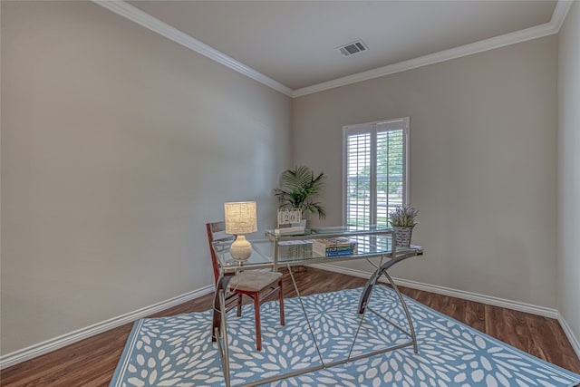 home office with crown molding and dark hardwood / wood-style flooring