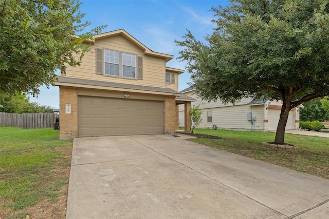 view of front property with a garage and a front yard