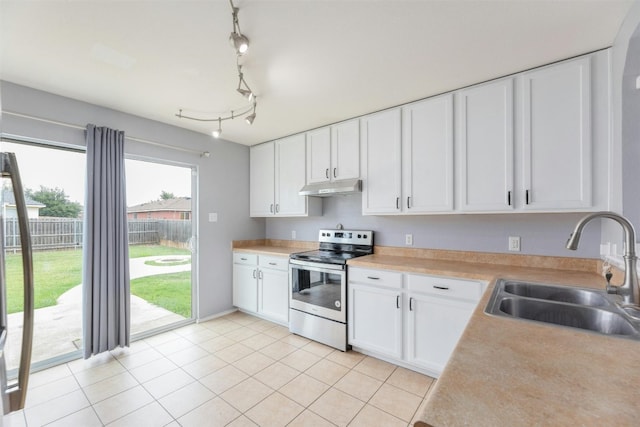 kitchen with stainless steel range with electric stovetop, white cabinetry, sink, and light tile patterned flooring