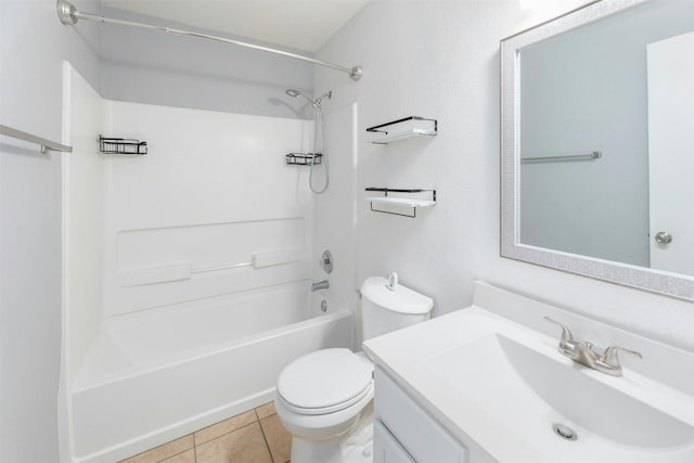 full bathroom with tile patterned flooring, toilet, bathing tub / shower combination, and vanity