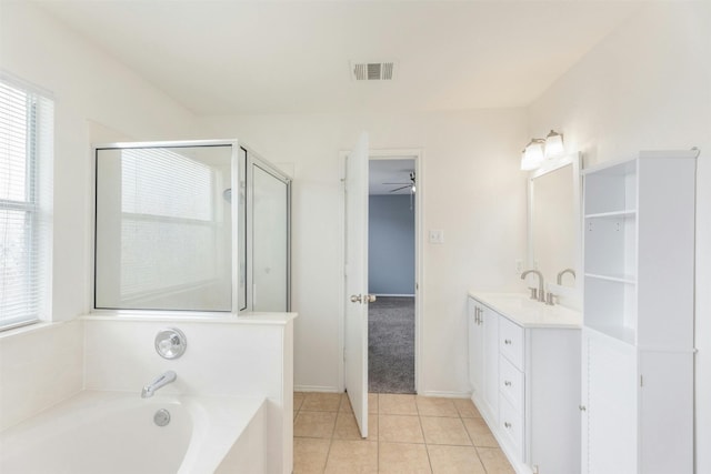 bathroom with vanity, separate shower and tub, tile patterned floors, and ceiling fan