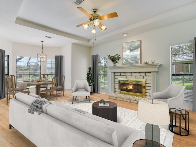 3503 Misty Creek Dr, Austin, TX 78735 - living room with a raised ceiling, plenty of natural light, and light wood-style flooring