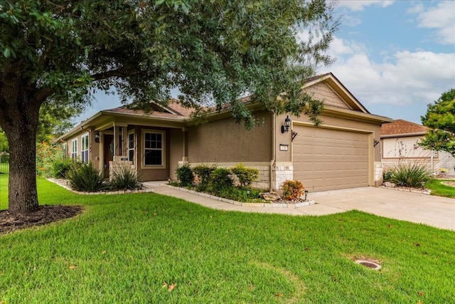 ranch-style house featuring a garage and a front yard