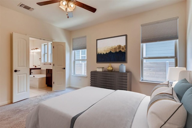 unfurnished bedroom featuring light carpet and a closet