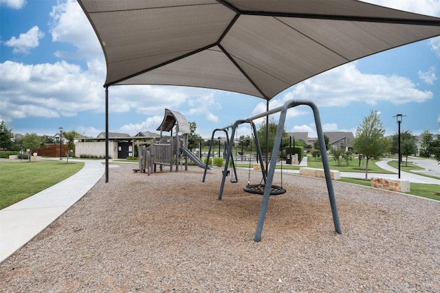 view of playground with a yard