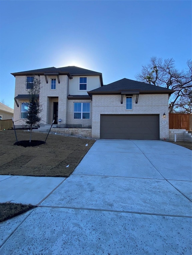 view of front of property with a garage