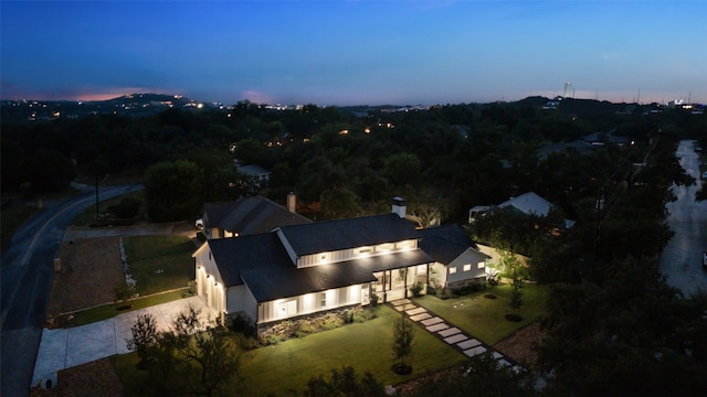 view of aerial view at dusk