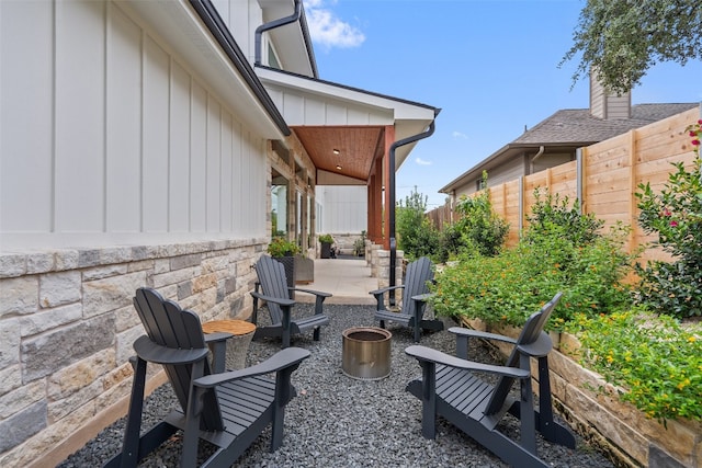 view of patio featuring a fire pit