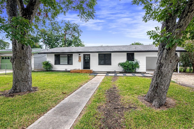 ranch-style home with a front yard