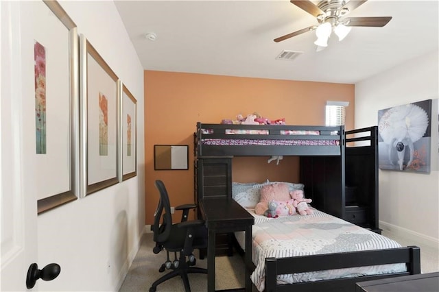 bedroom with ceiling fan and carpet floors