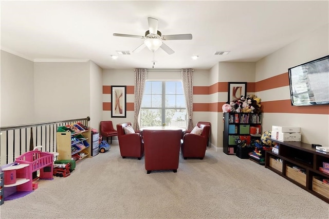 rec room with carpet flooring and ceiling fan