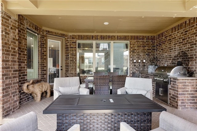 view of patio featuring area for grilling and an outdoor kitchen