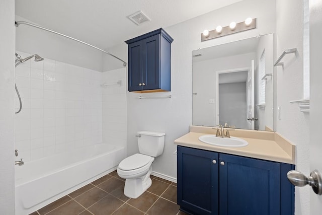 full bathroom with tile patterned floors, bathtub / shower combination, toilet, and vanity