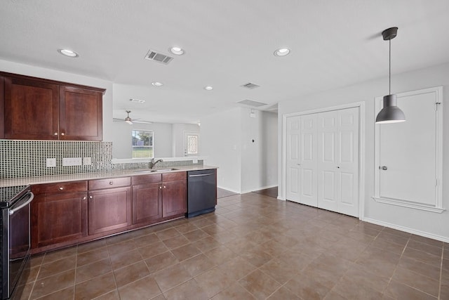 kitchen with hanging light fixtures, appliances with stainless steel finishes, sink, ceiling fan, and decorative backsplash