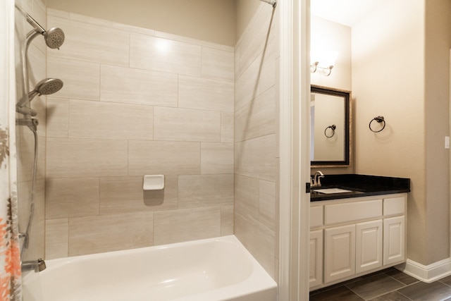 bathroom featuring vanity and shower / bathtub combination with curtain