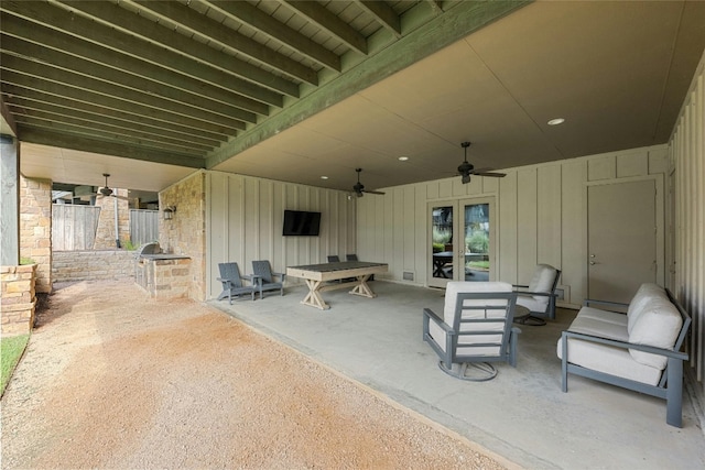 view of patio with ceiling fan